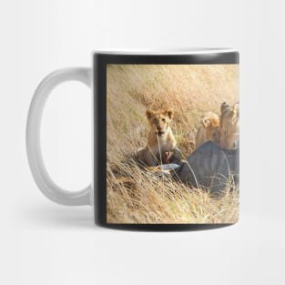 Lioness  & her Cubs at a Wildebeest Kill, Maasai Mara, Kenya Mug